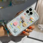 قاب موبایل آیفون اپوکسی بیرنگ روز شاد خرس و خرگوش برجسته + آویزست