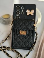 قاب موبایل آیفون مشکی بند زنجیری بلند بالشتی پروانه ای جاکارتی دار - Image 15