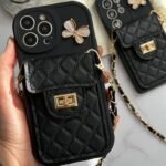 قاب موبایل آیفون مشکی بند زنجیری بلند بالشتی پروانه ای جاکارتی دار