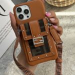 قاب موبایل آیفون فندی چرمی قفل فلزی جاکارتی + بندست بلند