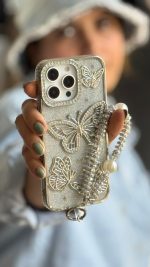 قاب موبایل ( آیفون - سامسونگ ) پروانه آموره نگین دار برجسته شاینی + بندست - Image 2
