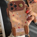 قاب موبایل آیفون گل دریایی جیر سنگشور قهوه ای + بند ست