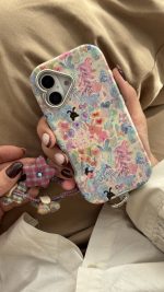 قاب موبایل آیفون خرگوش واندرلند + بندست گل پارچه ای - Image 5