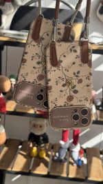 قاب موبایل ( آیفون ) گل رز فلورا قهوه ای + بندست چرمی - Image 5