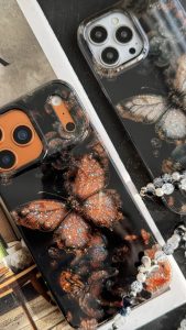 قاب موبایل آیفون پروانه ترنسپرنت مشکی پولکی طلایی - Image 2